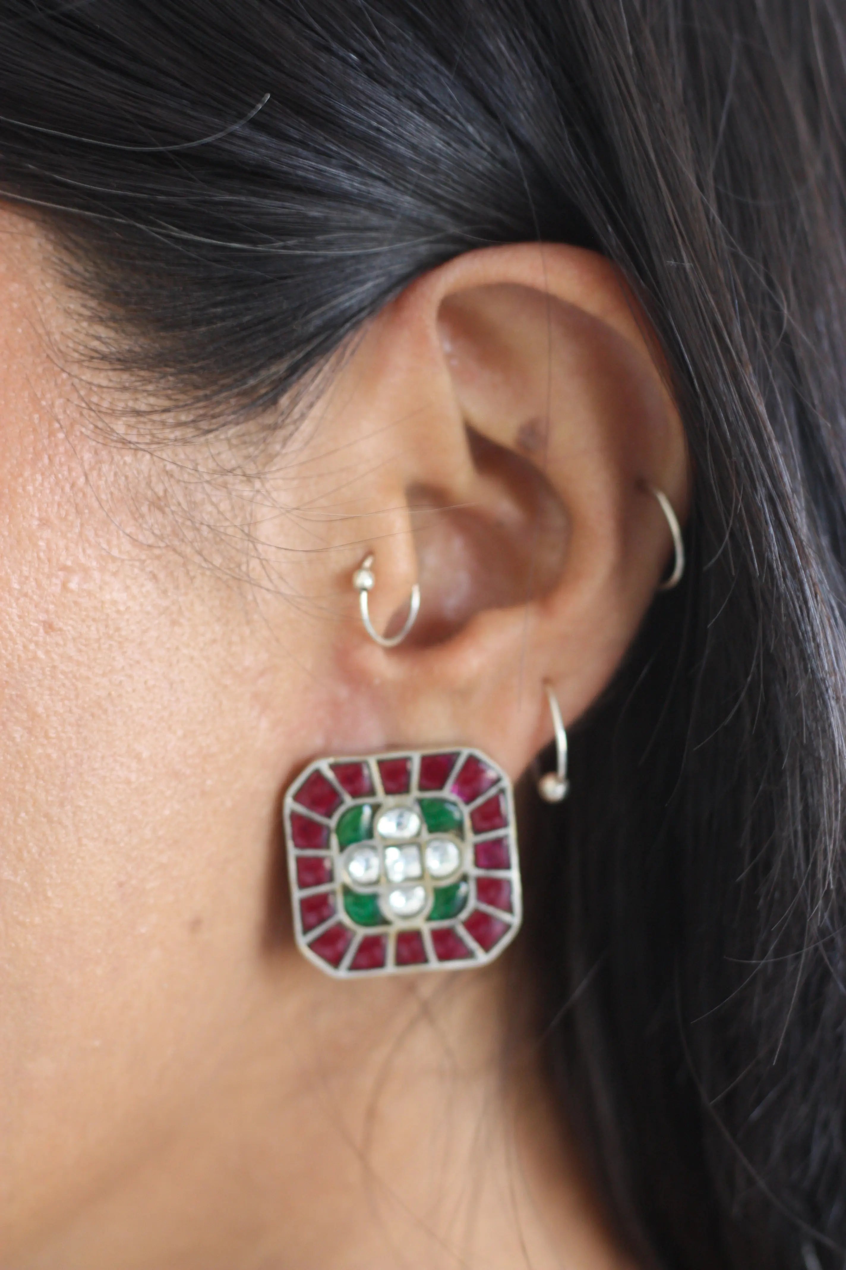 square emerald studs